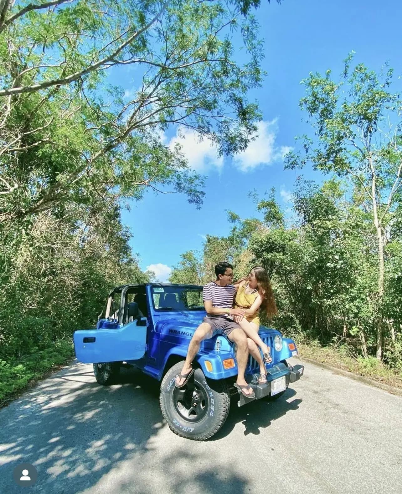 Cozumel Custom Private Jeep Discovery - couple on blue jeep jungle in Cozumel