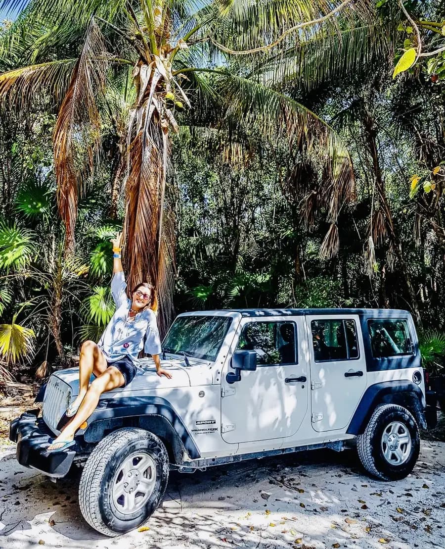 Cozumel Custom Private Jeep Discovery - jeep under palms beach in Cozumel